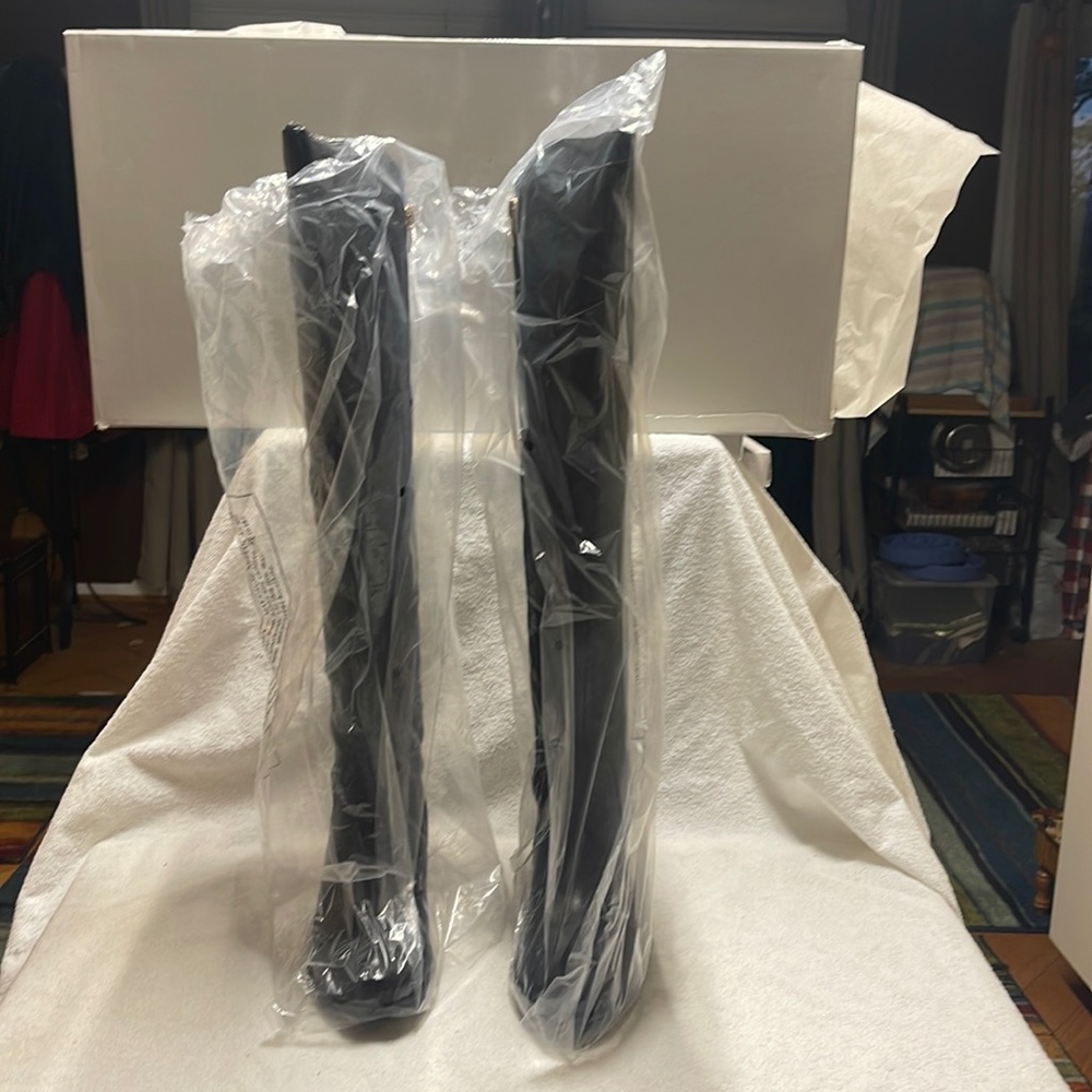 Tall knee high boots NIB. Smoke free home. No tears.